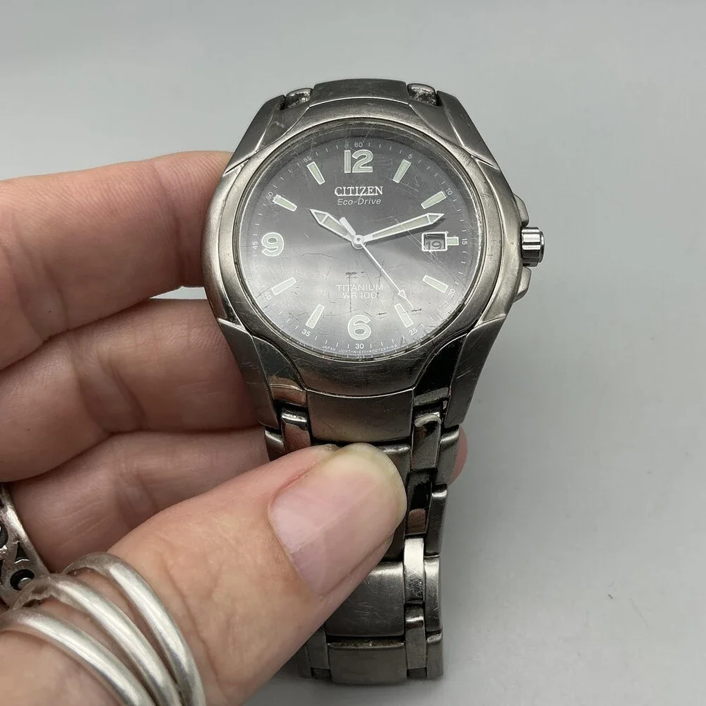 Citizen Eco-Drive Titanium Mens Watch 40mm Black Dial WR 100 E111-K006368 7.25